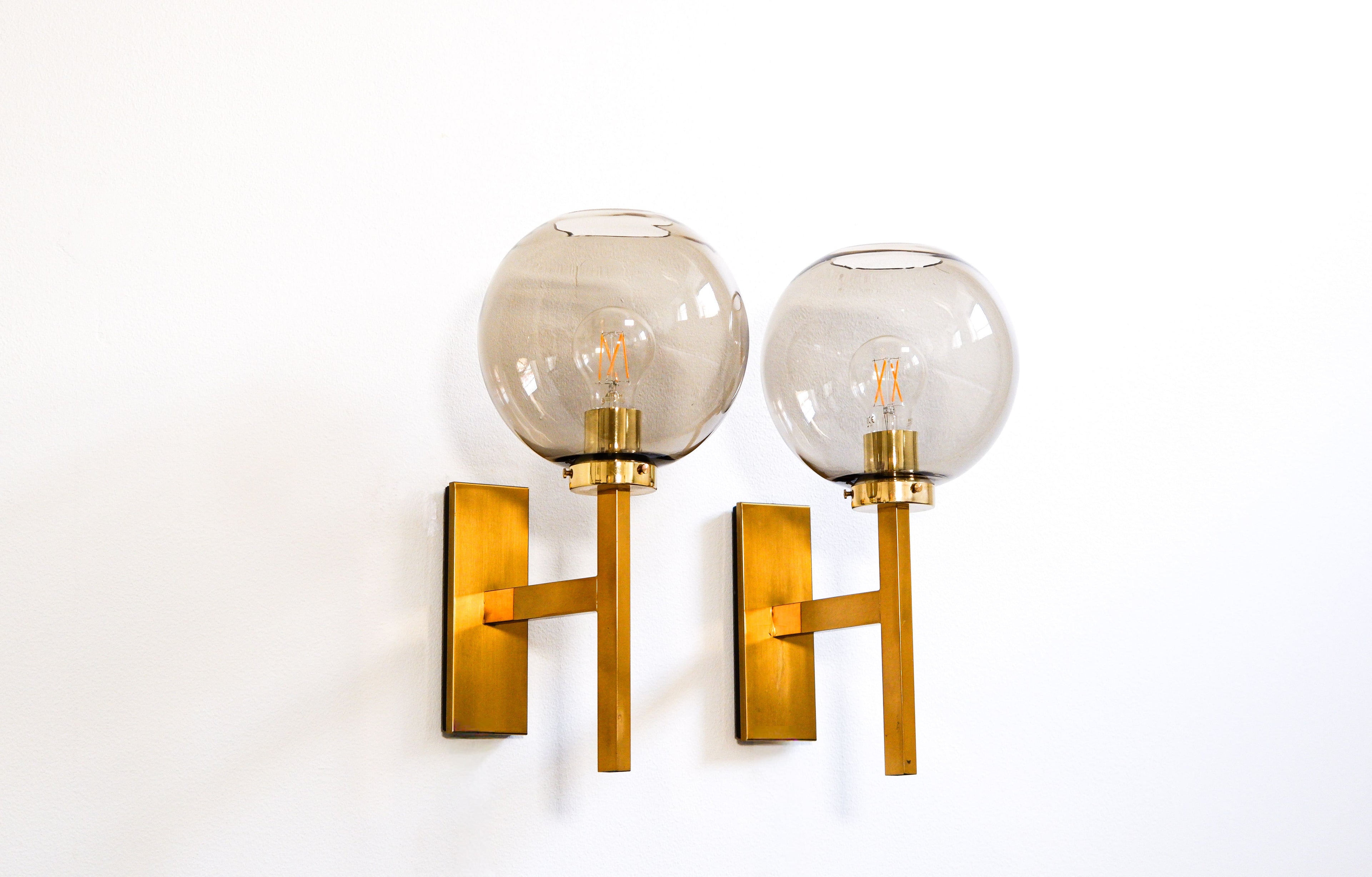 Pair of Holger Johansson wall lamps.