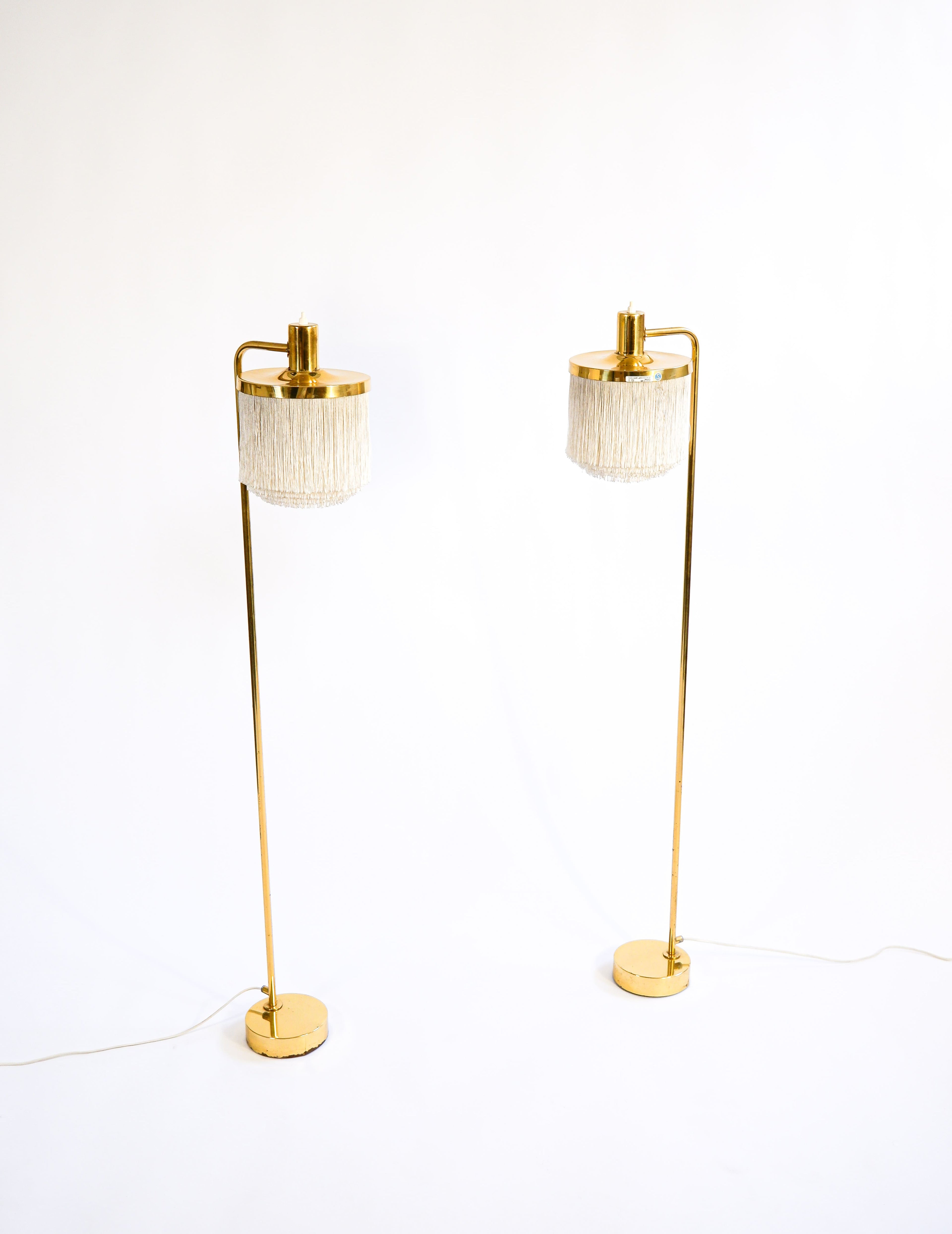 Hans Agne Jakobsson pair of Floor lamp model G 109. Cira 1960