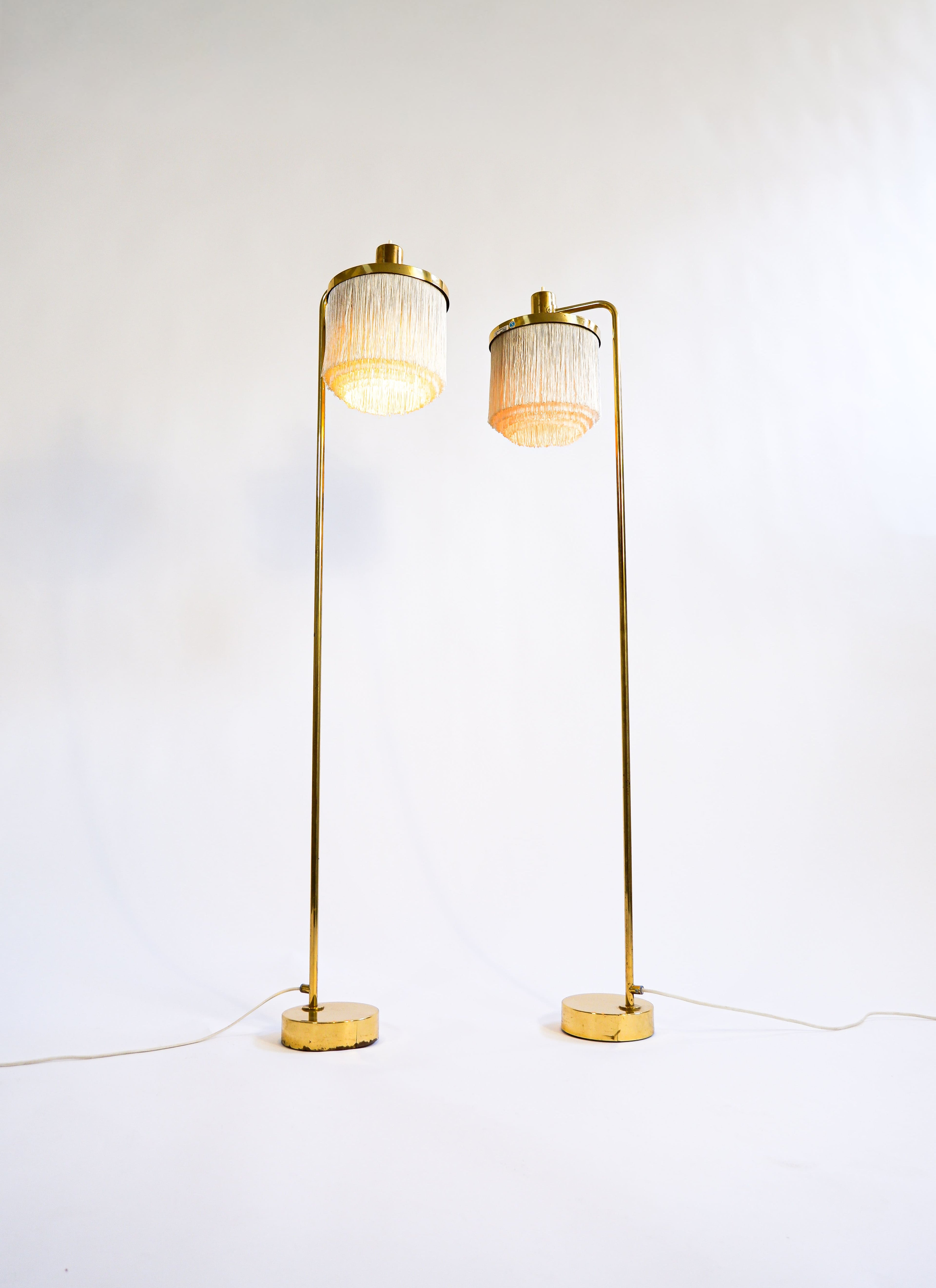 Hans Agne Jakobsson pair of Floor lamp model G 109. Cira 1960