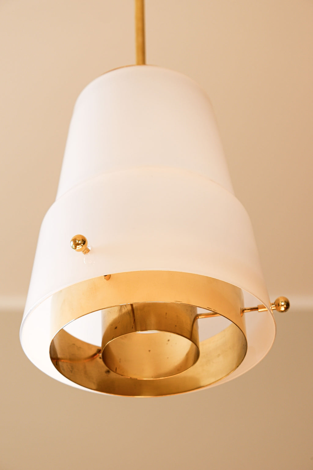 Paavo Tynell, pair of pendant in opal & brass, Idman circa 1940.