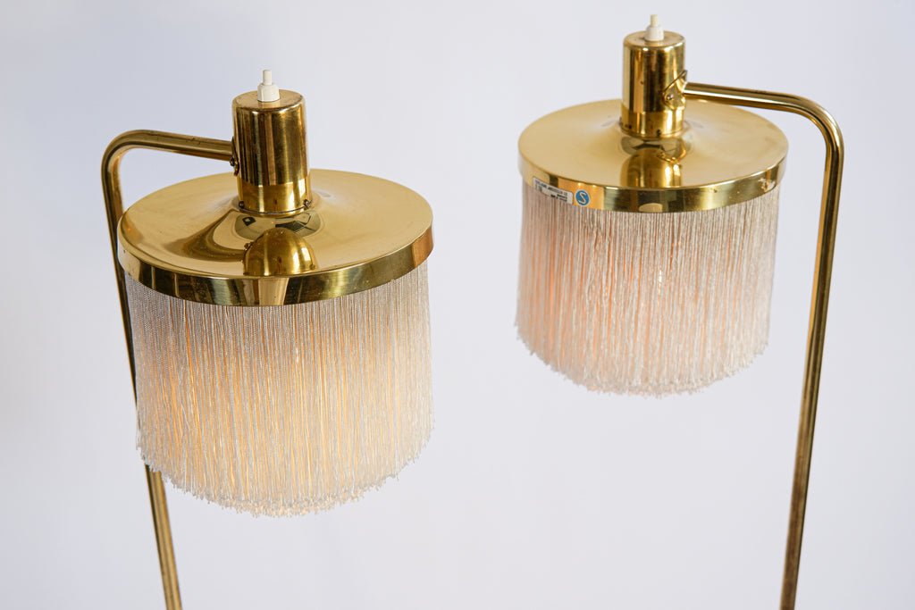 Hans Agne Jakobsson pair of Floor lamp model G 109. Cira 1960
