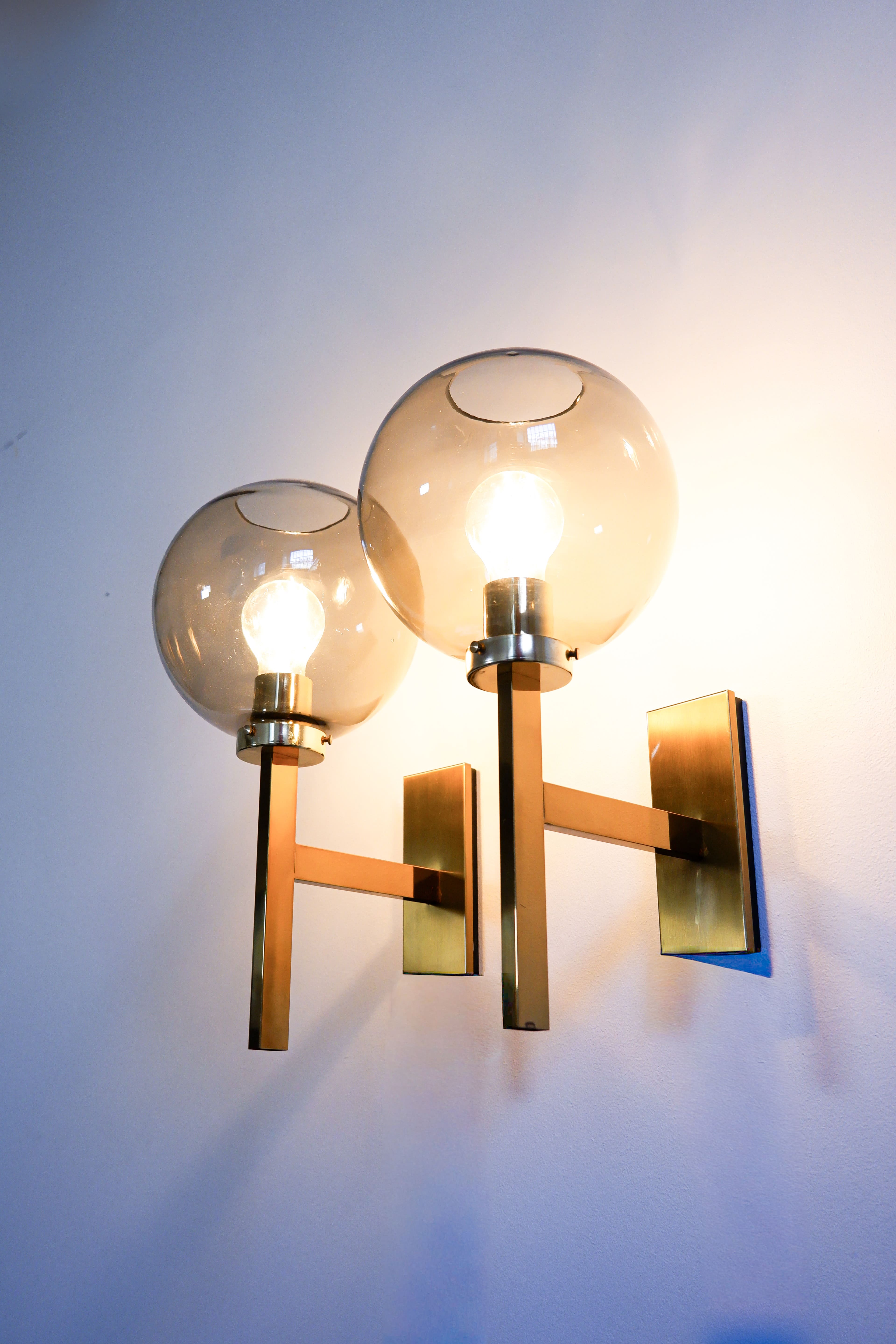 Pair of Holger Johansson wall lamps.