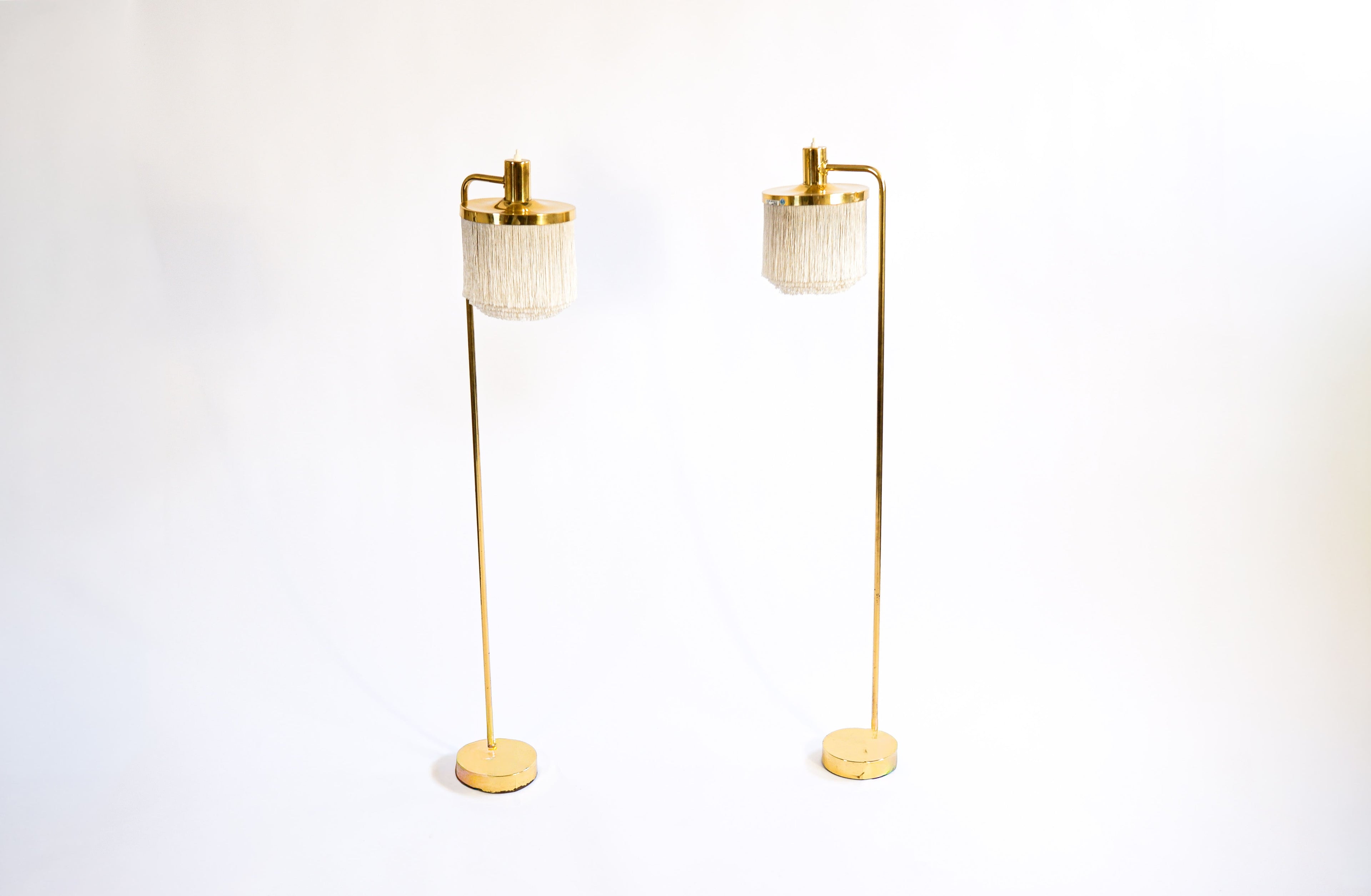 Hans Agne Jakobsson pair of Floor lamp model G 109. Cira 1960