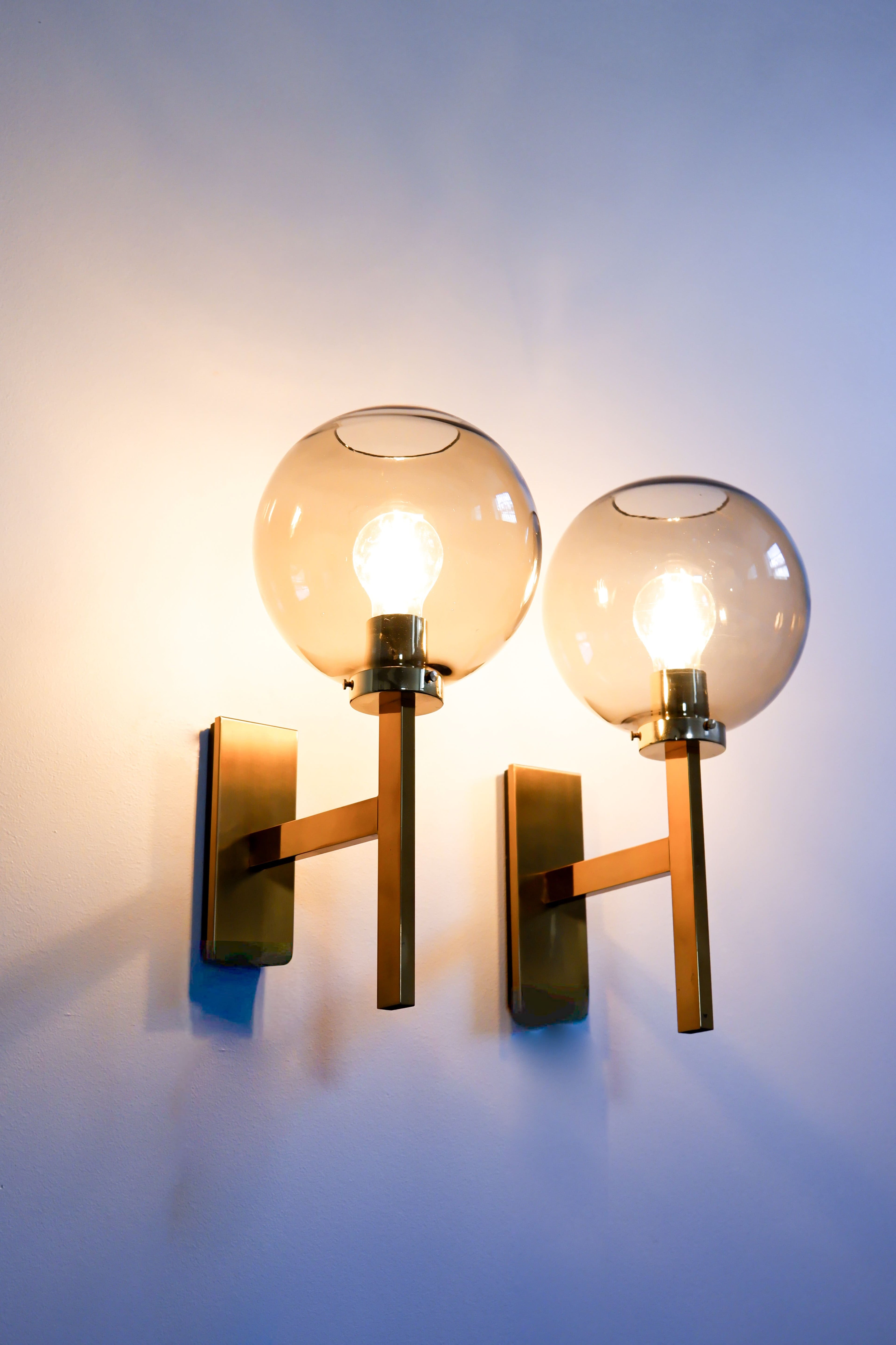 Pair of Holger Johansson wall lamps.