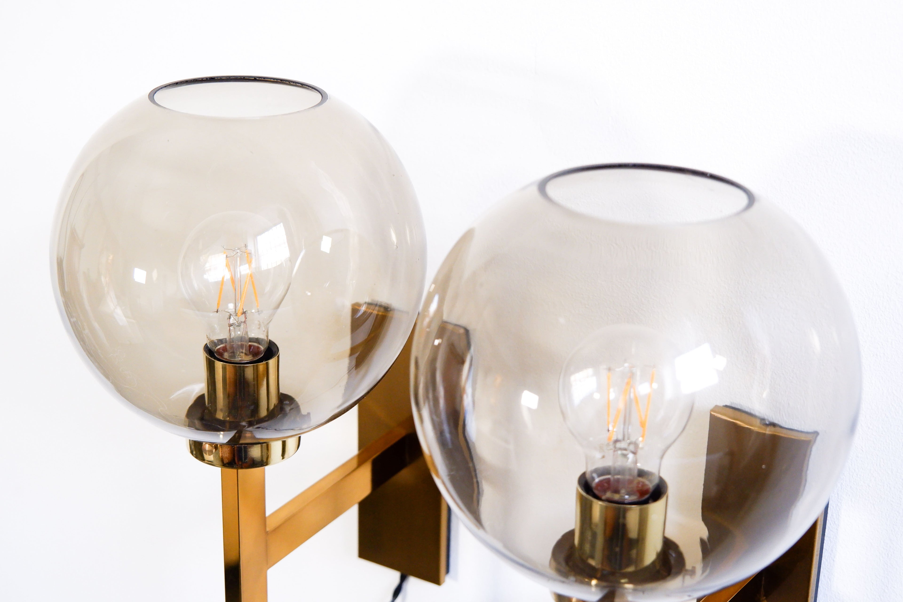 Pair of Holger Johansson wall lamps.