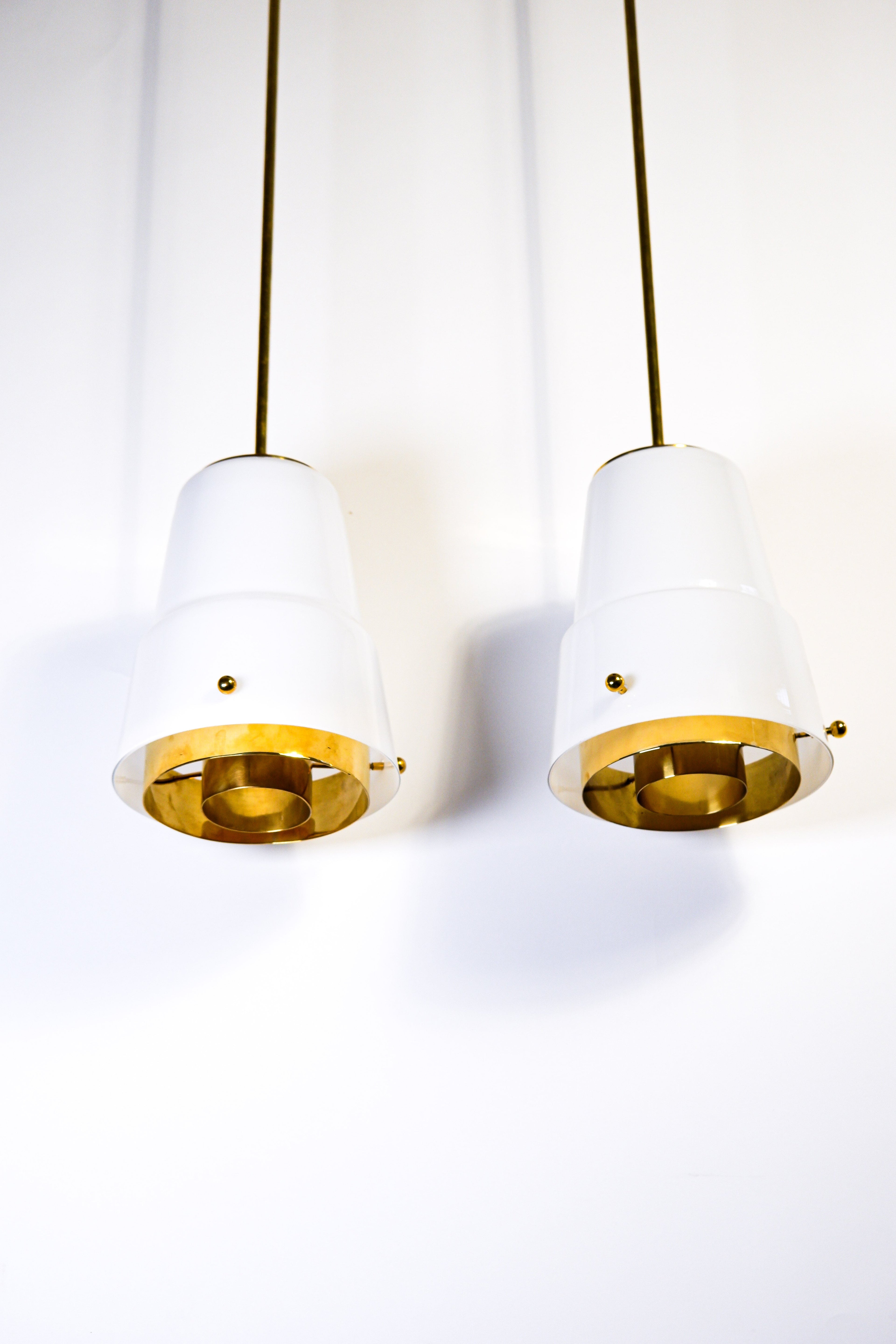 Paavo Tynell, pair of pendant in opal & brass, Idman circa 1940.