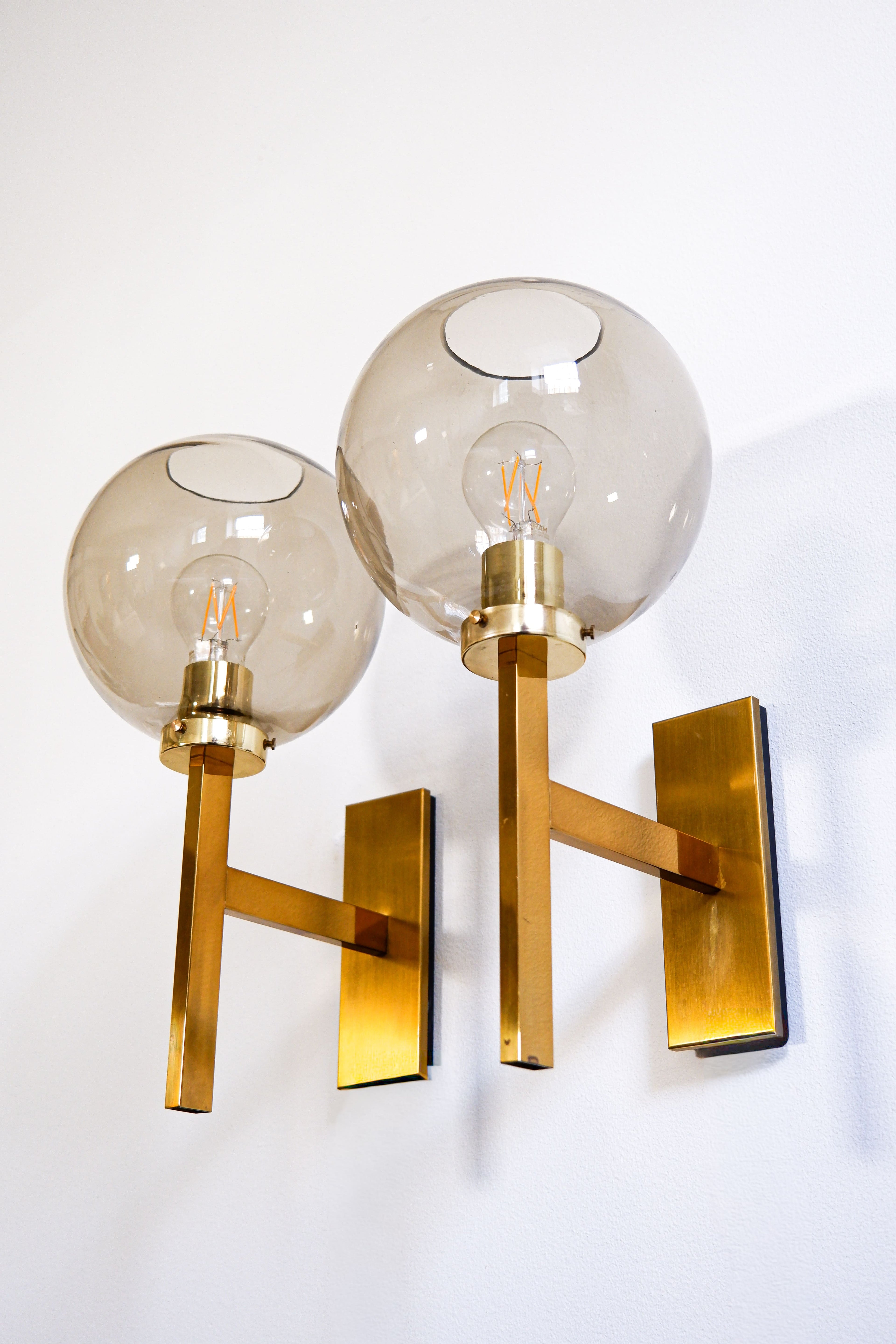 Pair of Holger Johansson wall lamps.