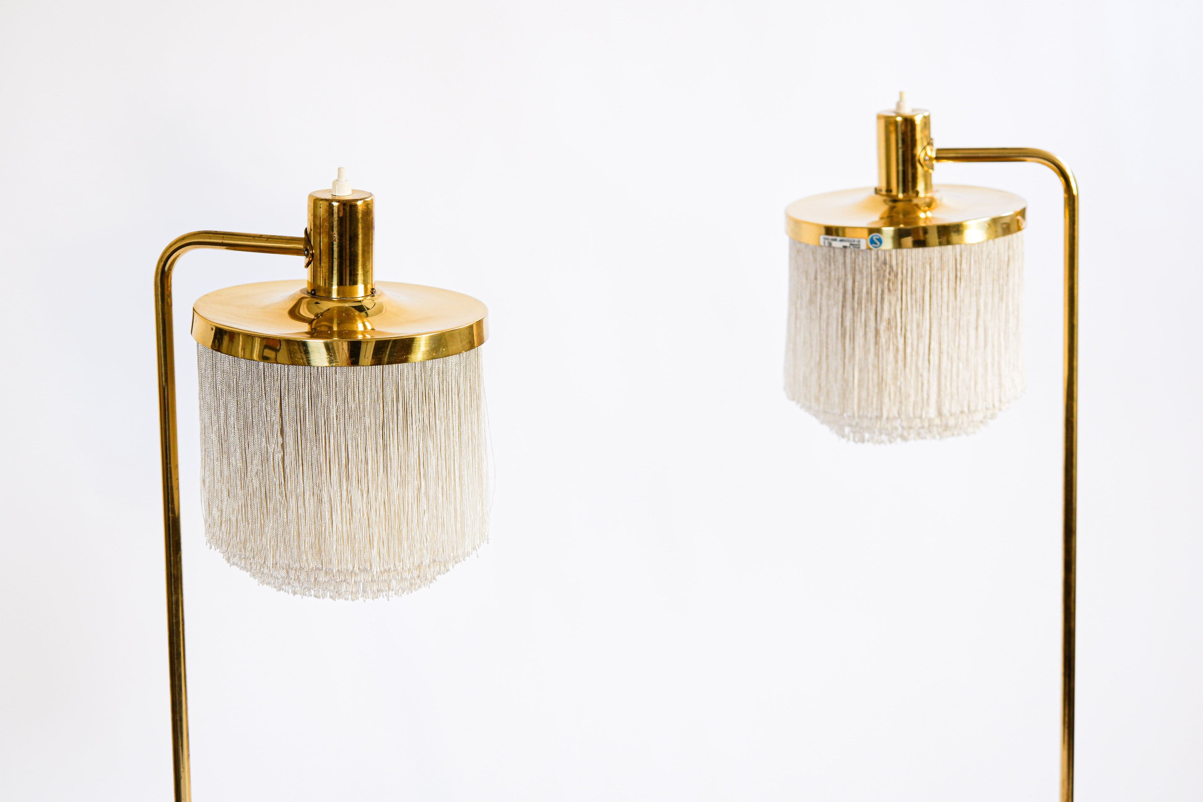 Hans Agne Jakobsson pair of Floor lamp model G 109. Cira 1960