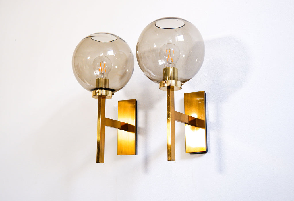Pair of Holger Johansson wall lamps.