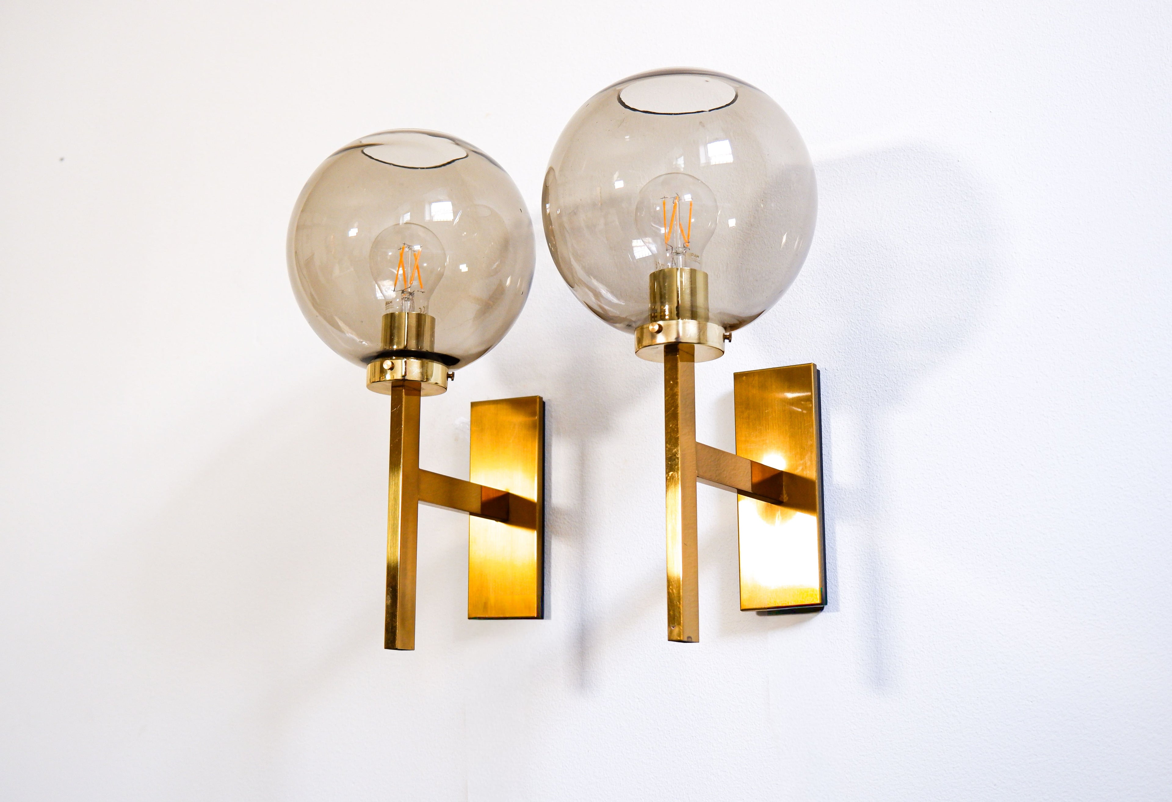 Pair of Holger Johansson wall lamps.