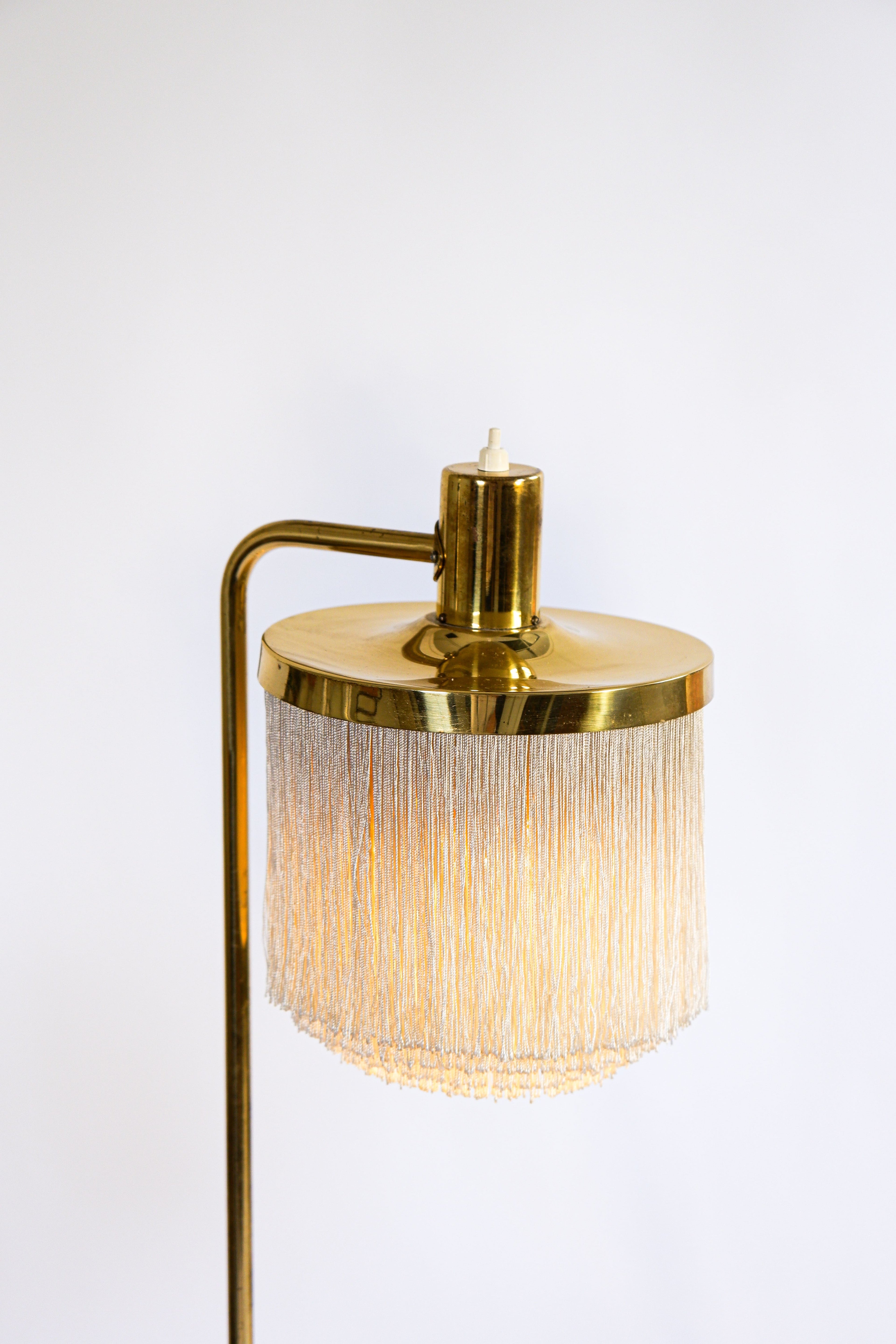 Hans Agne Jakobsson pair of Floor lamp model G 109. Cira 1960
