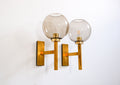 Pair of Holger Johansson wall lamps.
