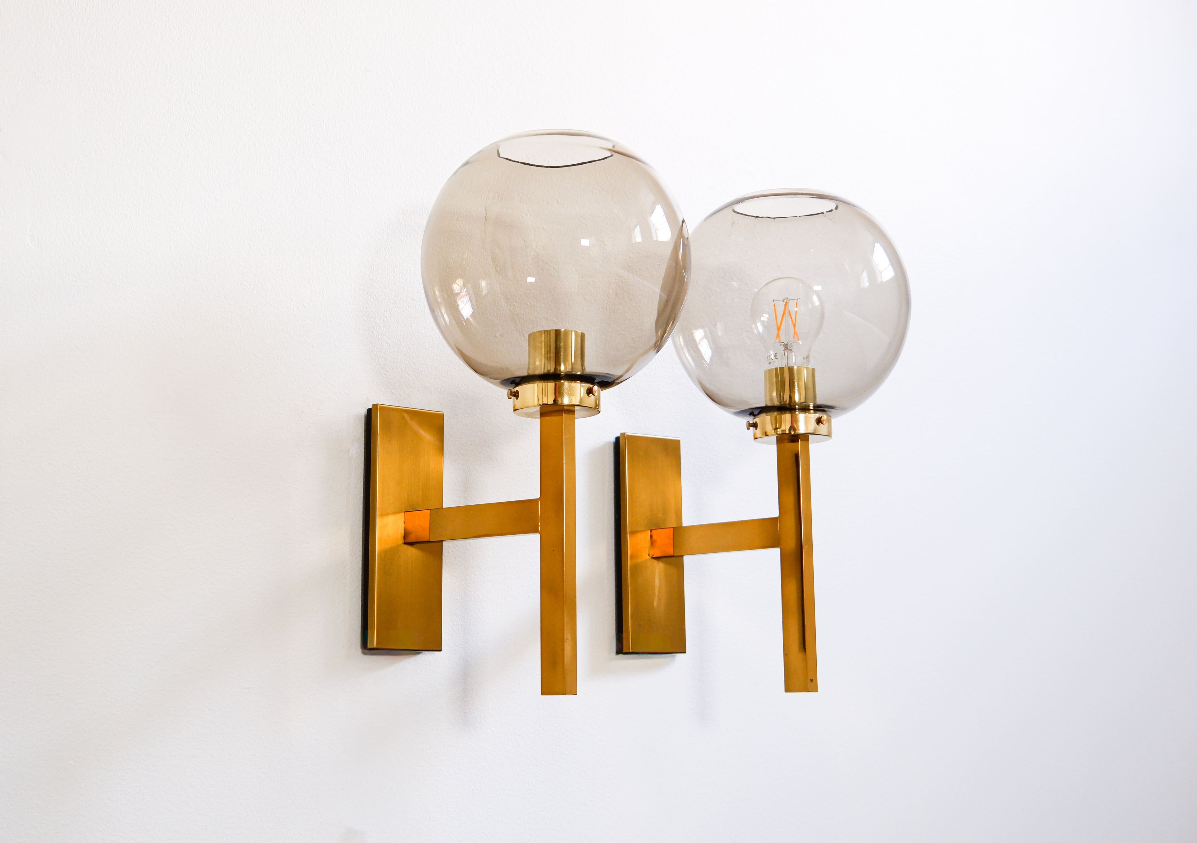 Pair of Holger Johansson wall lamps.