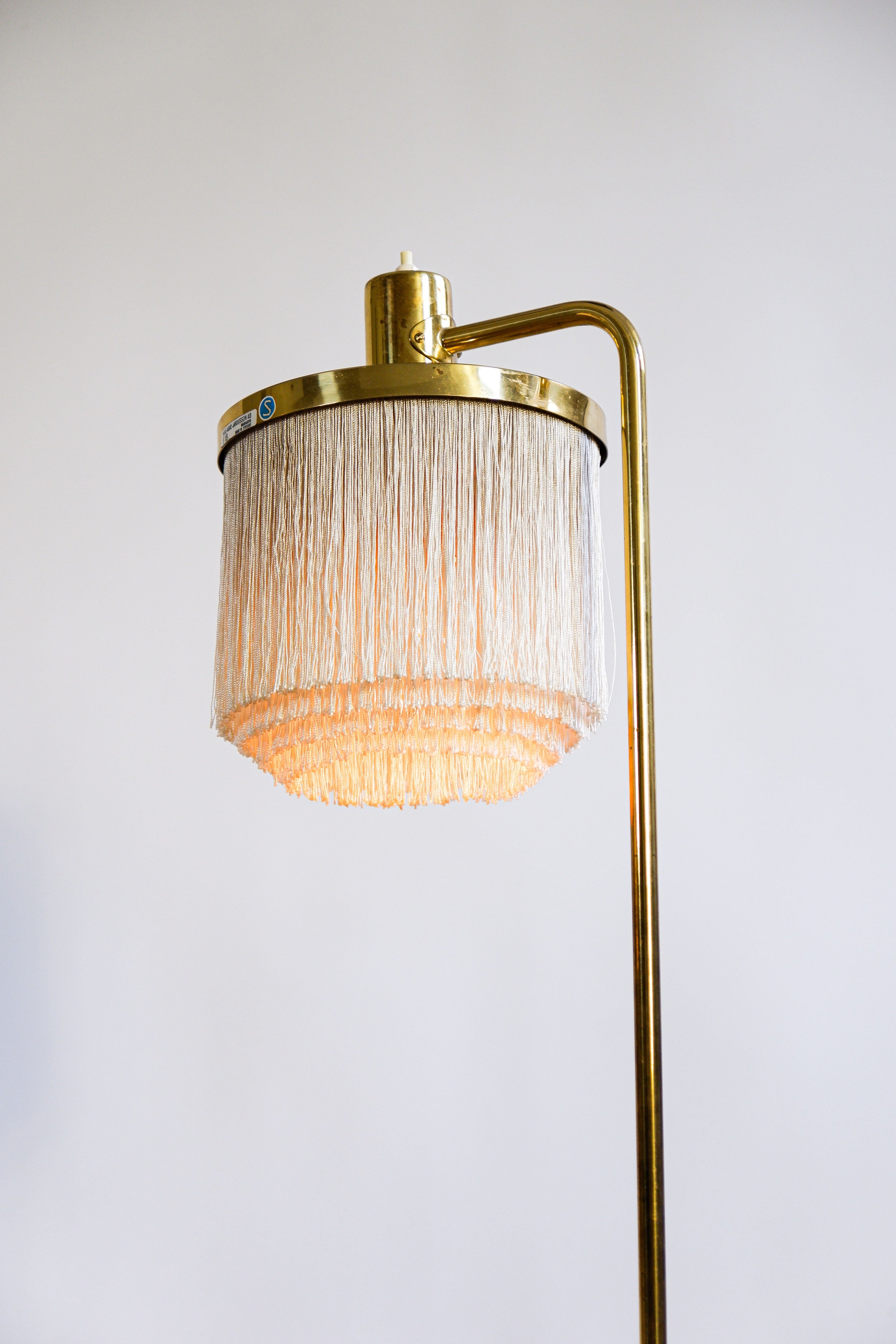 Hans Agne Jakobsson pair of Floor lamp model G 109. Cira 1960