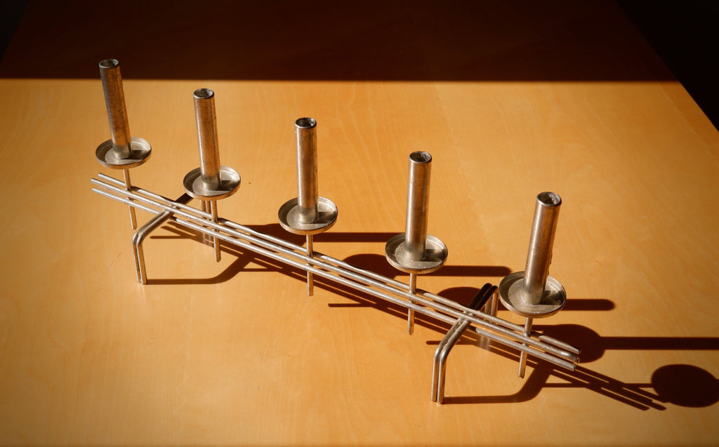 Paavo Tynell Candelholder circa 1960, Nikel brass.