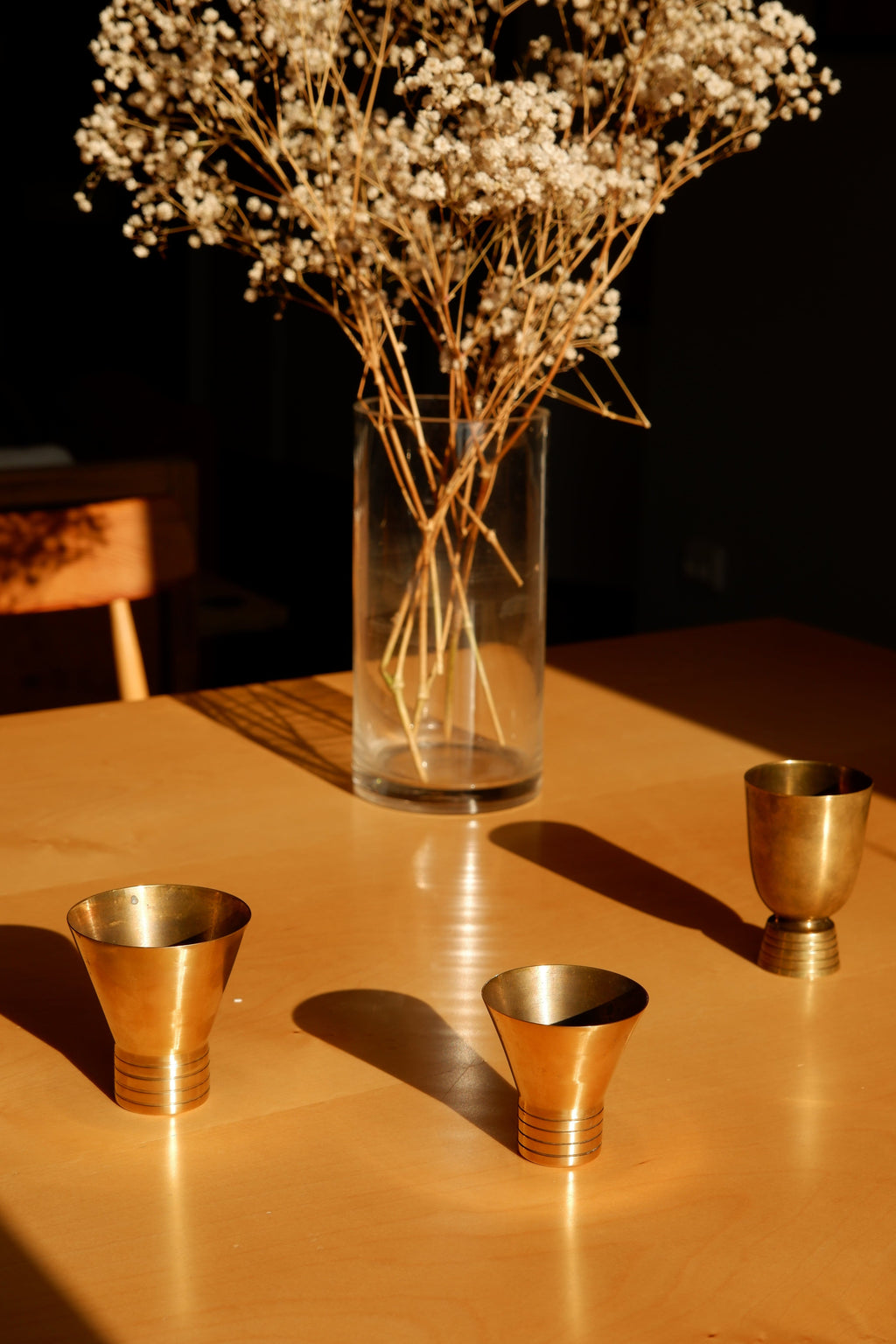 Set of three brass cups designed by Paavo Tynell for TAITO circa 1940