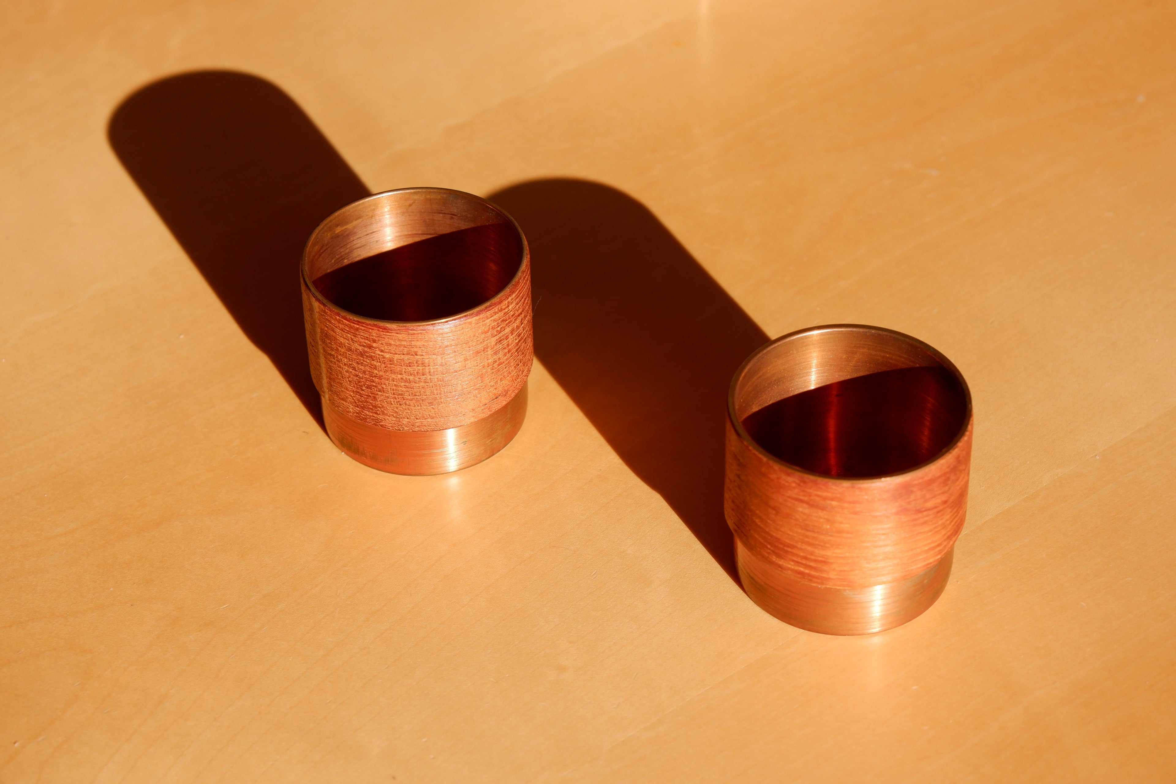 Pair of finnish bowls in copper and teak, 60's.