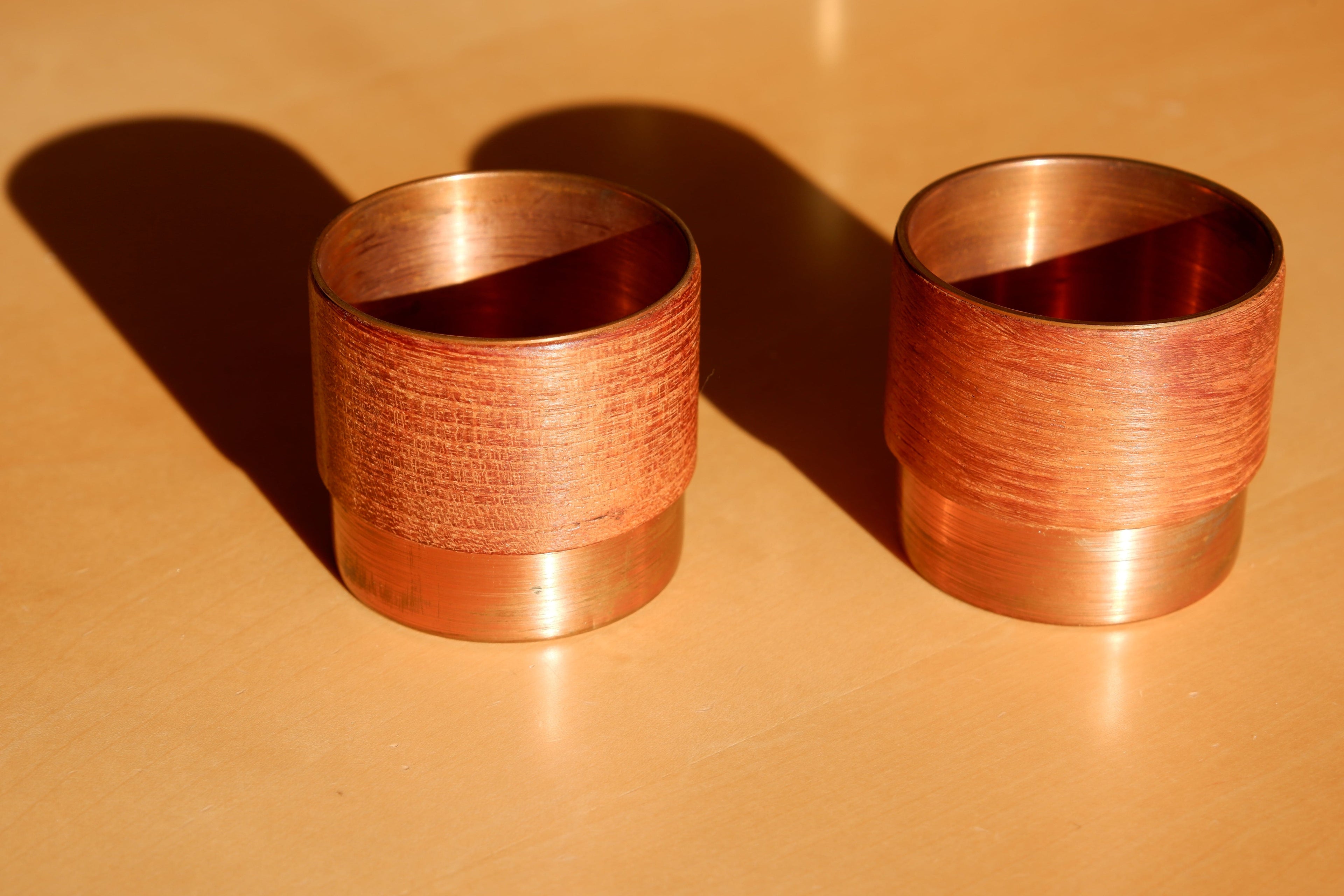 Pair of finnish bowls in copper and teak, 60's.