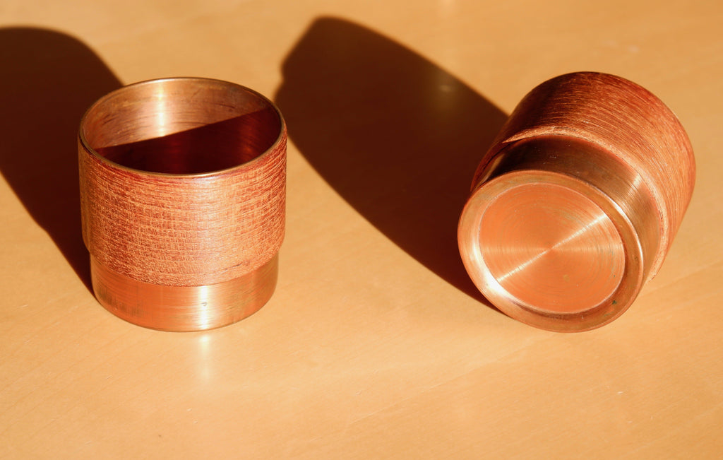 Pair of finnish bowls in copper and teak, 60's.