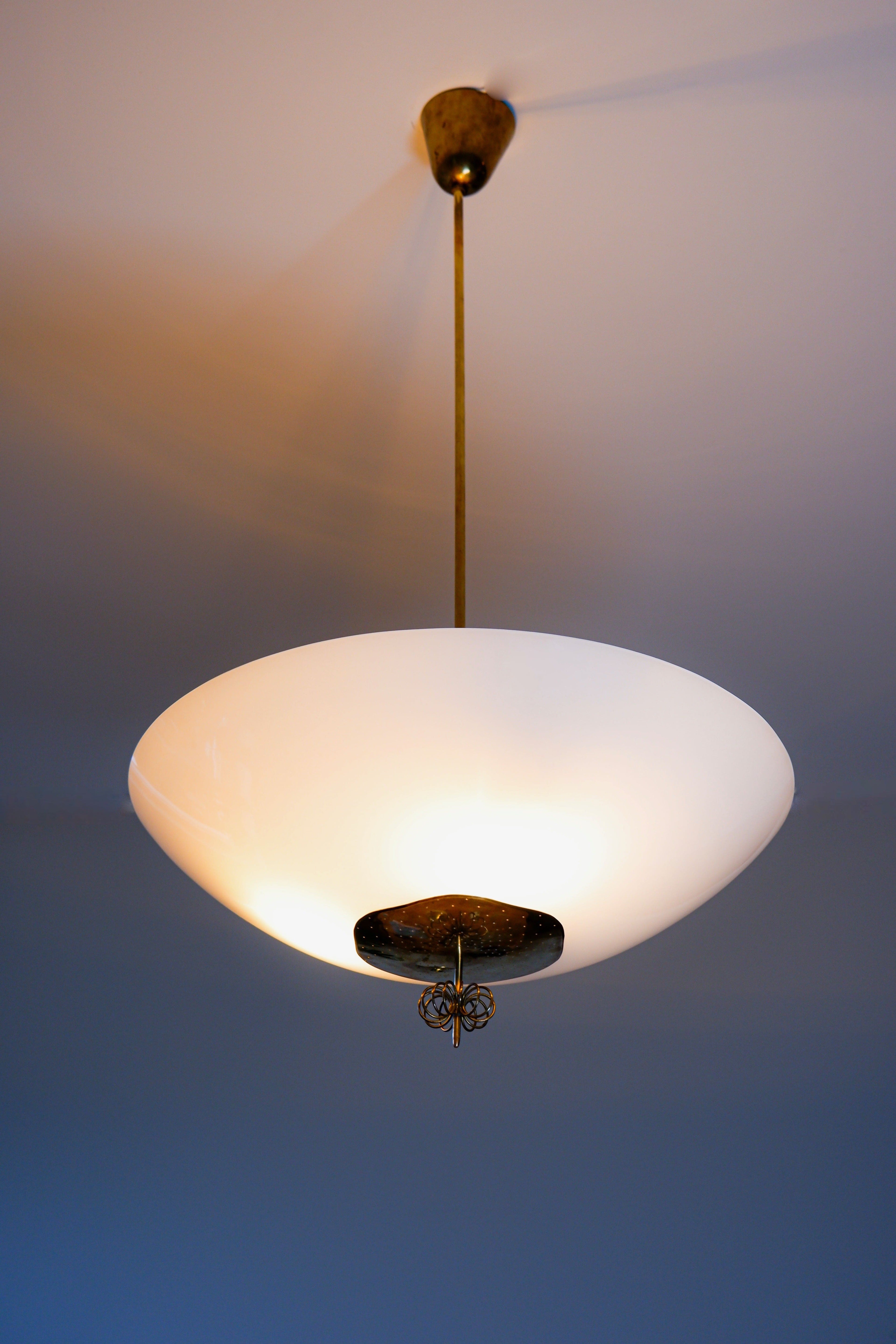 Paavo Tynell Oversized chandelier circa 1940, Opal & brass.