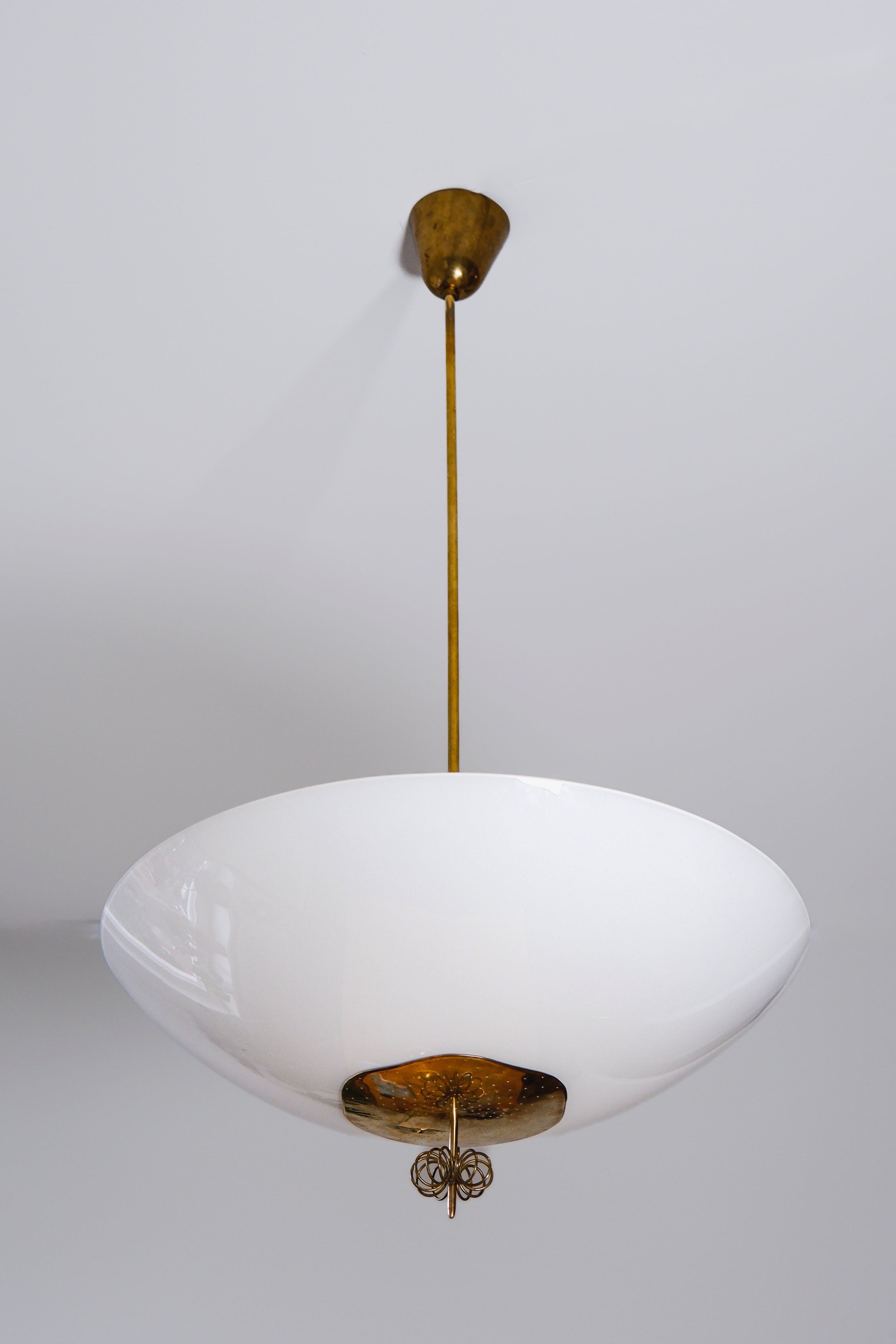 Paavo Tynell Oversized chandelier circa 1940, Opal & brass.