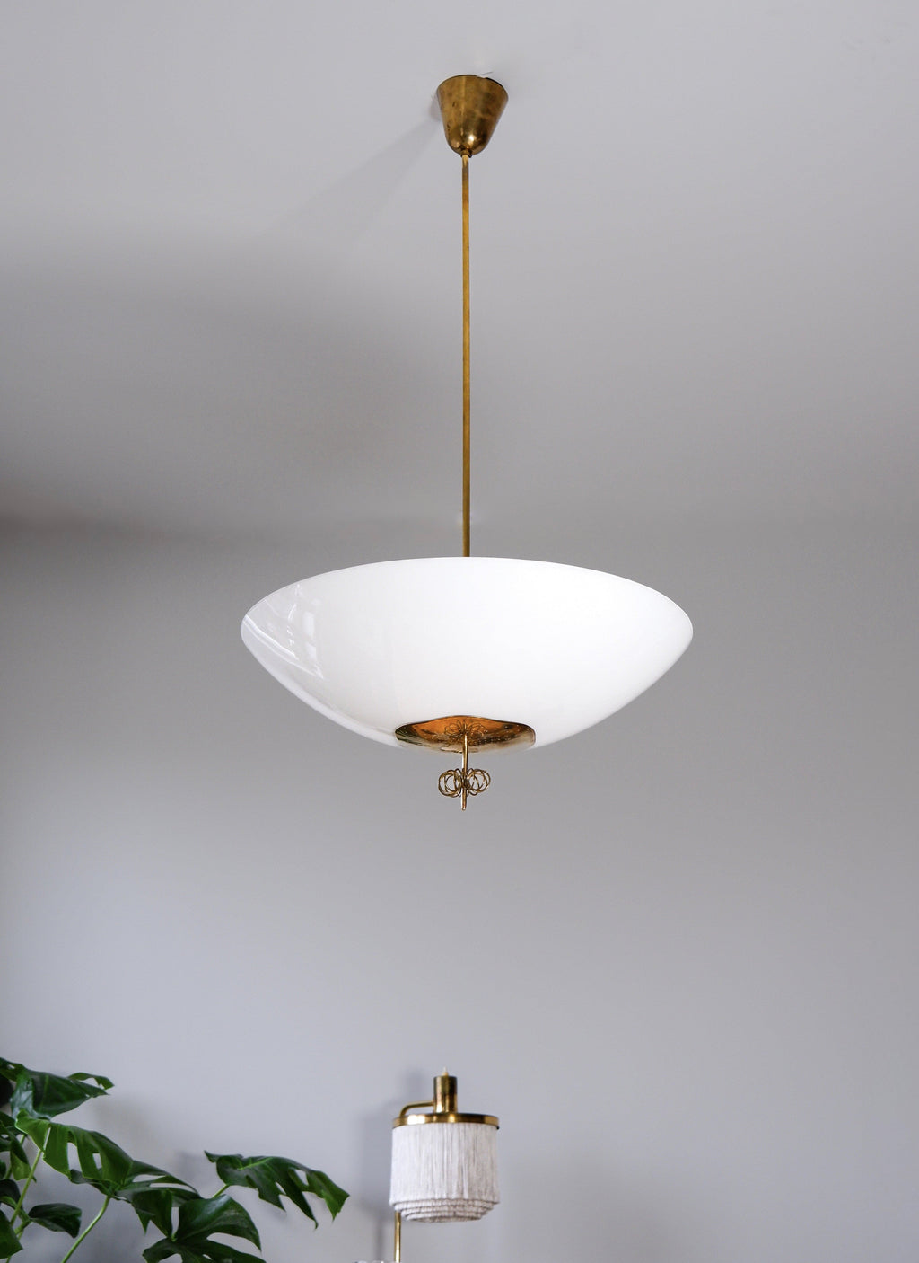 Paavo Tynell Oversized chandelier circa 1940, Opal & brass.