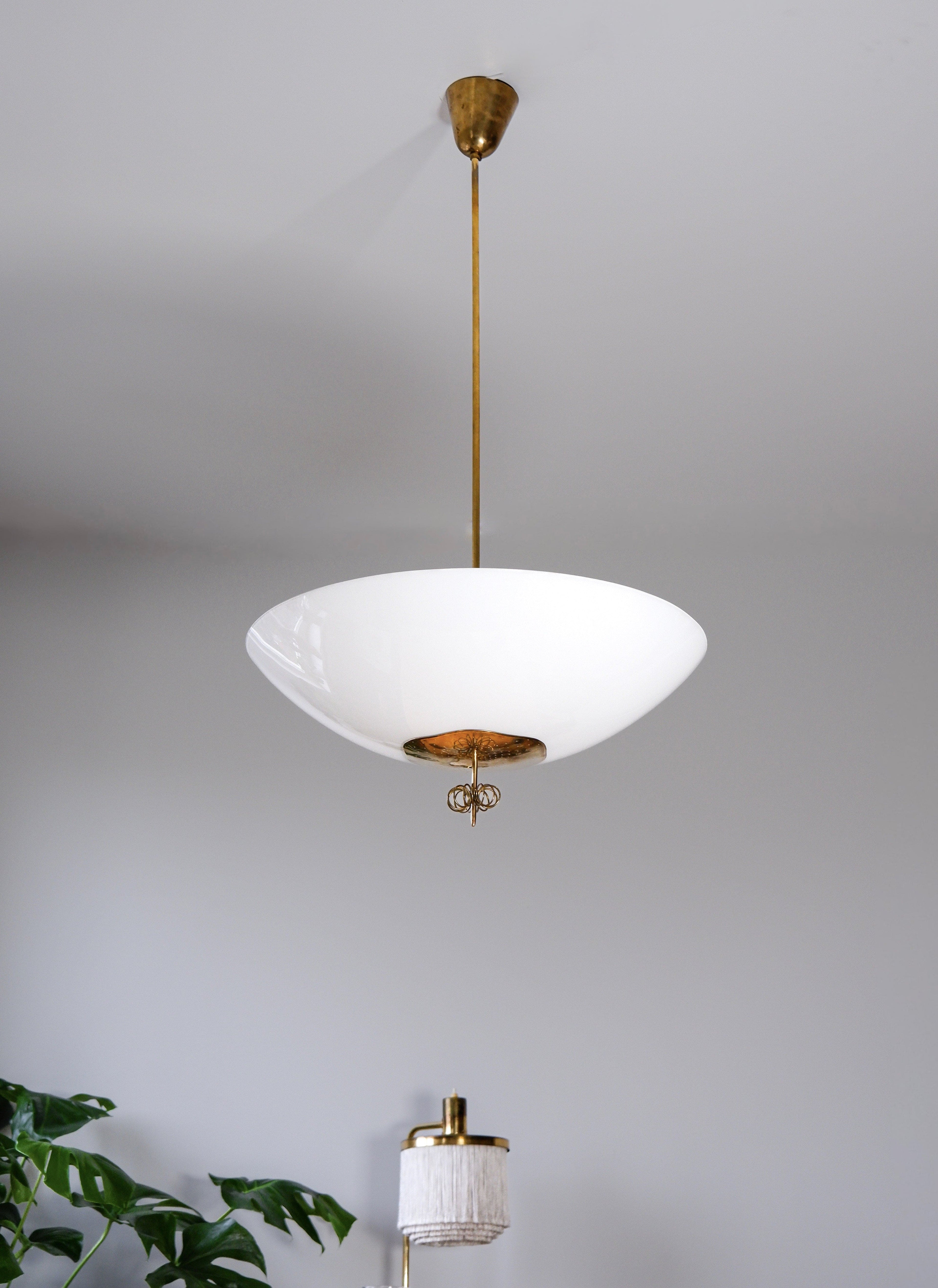 Paavo Tynell Oversized chandelier circa 1940, Opal & brass.