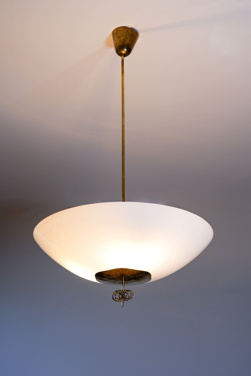 Paavo Tynell Oversized chandelier circa 1940, Opal & brass.